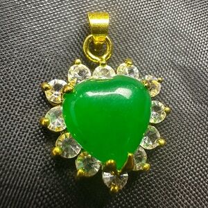 18KGP Green Heart Pendant with white shiny stones surrounding Gold Accents